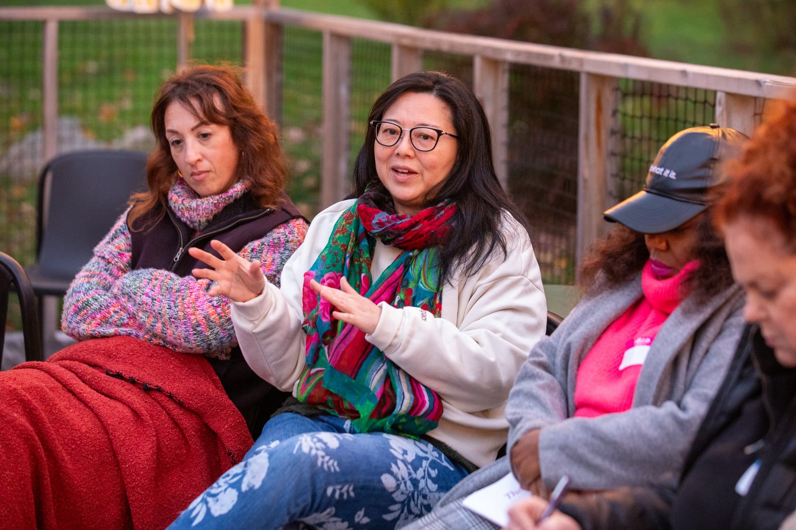 Women sharing reflections in an outdoor circle