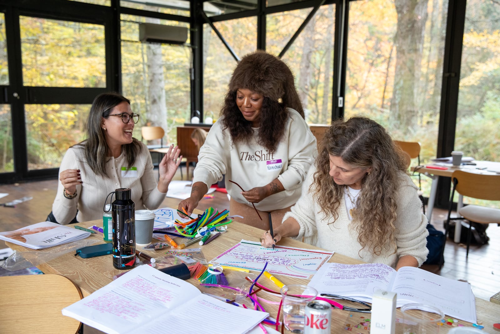 Participants creating their next-chapter boards together at The Shift